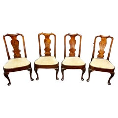 Set of Four English George II Period Walnut Side Chairs with Shelled Carved Legs