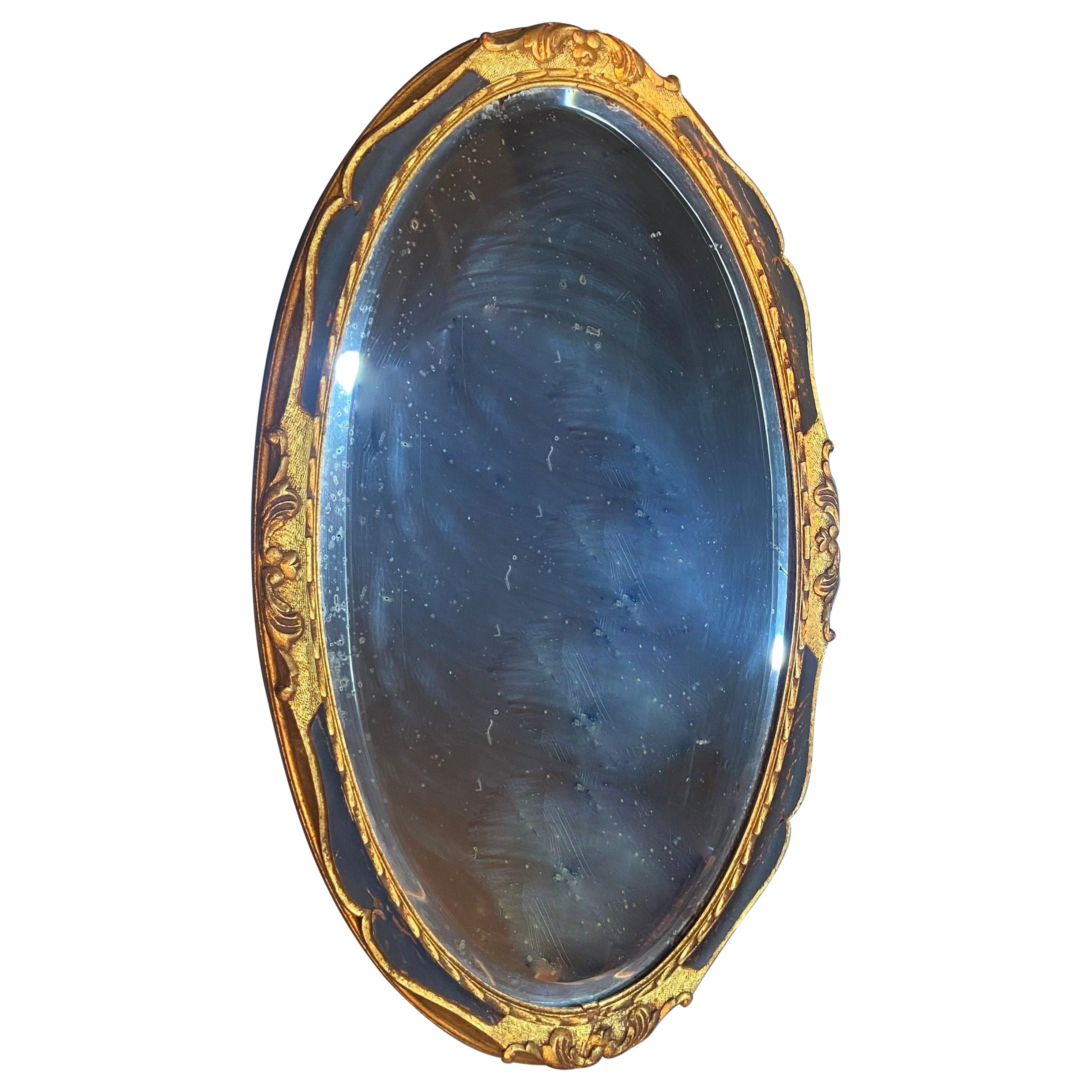 19th Century French Oval Hand Carved Decorated Giltwood Wall Mirror For Sale