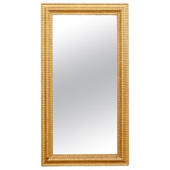 Miroir français du 19ème siècle de forme rectangulaire, en bois sculpté et doré