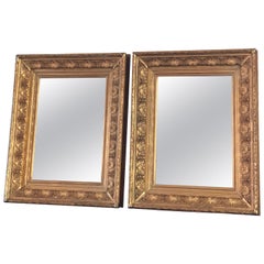 Pair of Victorian Rich Carved and Detailed Giltwood Mirrors