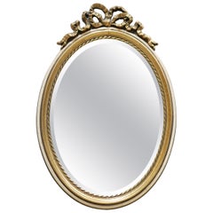 Old Louis XVI Style Oval Mirror in Gilded Wood