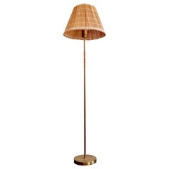 Paavo Tynell Floor Lamp Model K10-13 for Idman circa 1950, Brass & Rattan