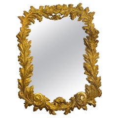 Retro Grand Scale Italian Giltwood Heavily Carved Mirror W/ Distressed Glass Plate