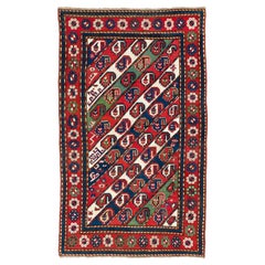 Ancien tapis caucasien Gendje Kazak à rayures diagonales