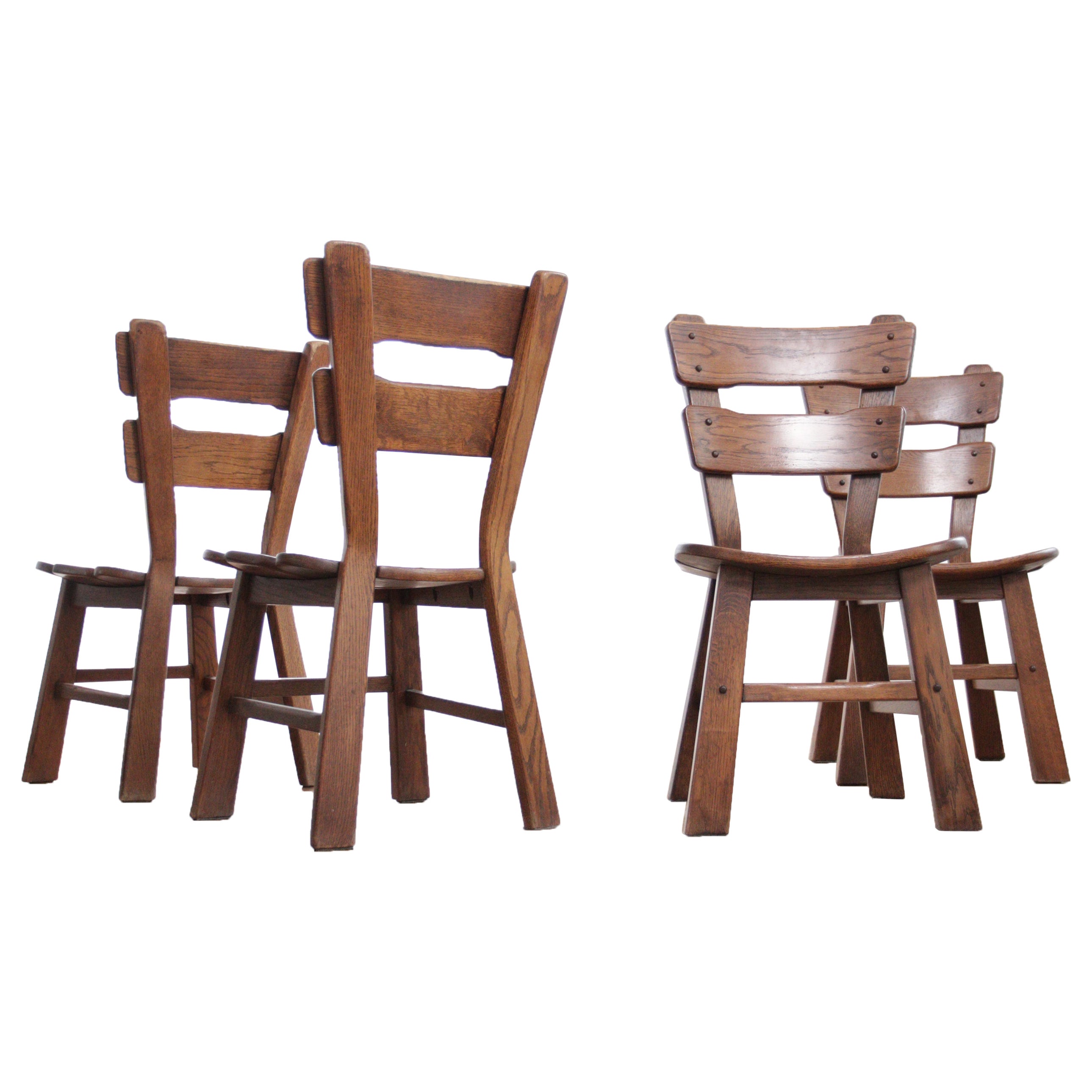 Ensemble de 4 chaises de salle à manger en chêne à dossier échelonné de style Brutaliste hollandais en vente