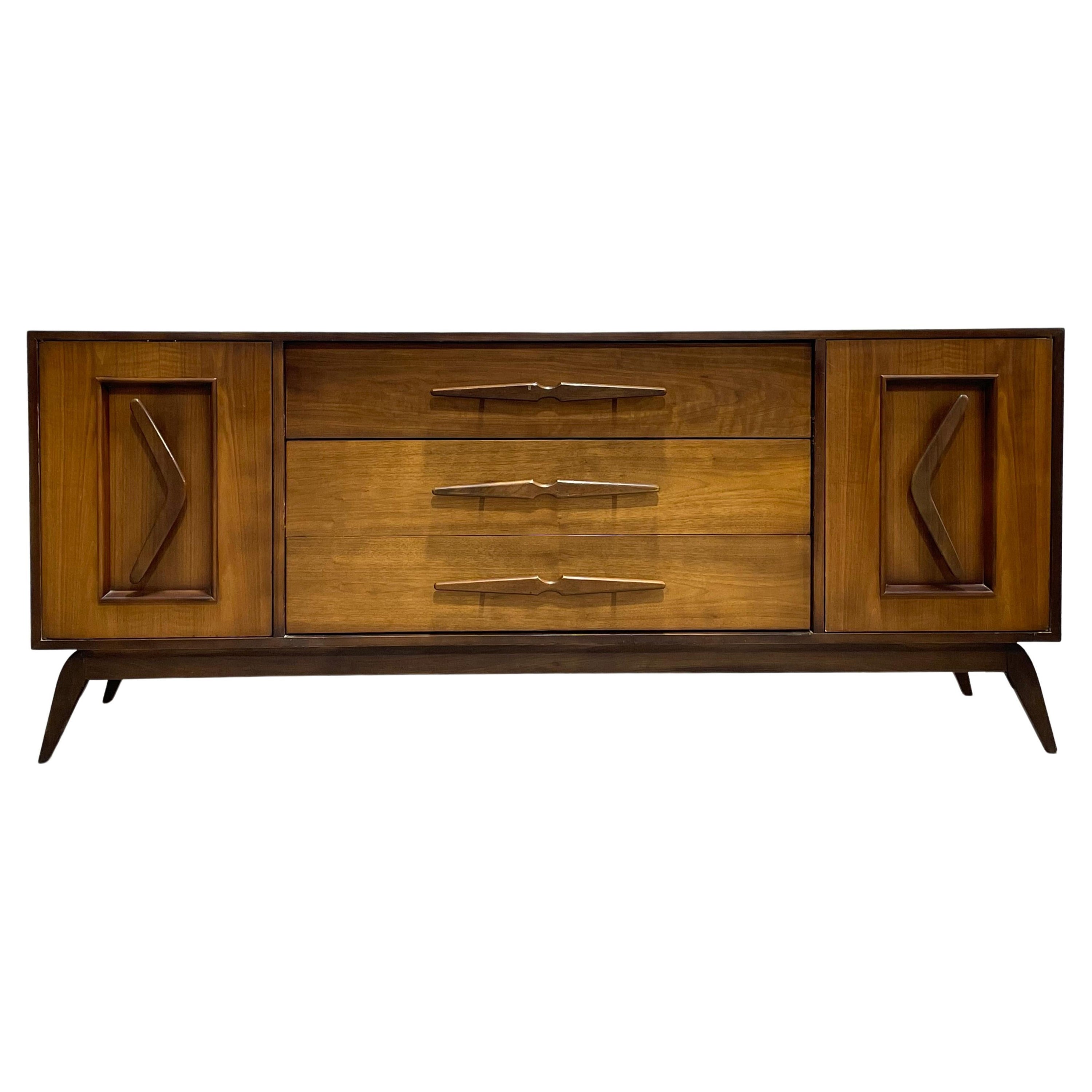 Long + Sexy Mid-Century Modern Sculpted Dresser / Sideboard, circa 1960s For Sale