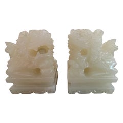 Pair of Chinese Hand Carved White Jade Jadeite Foo Dog Sculpture, circa 1920