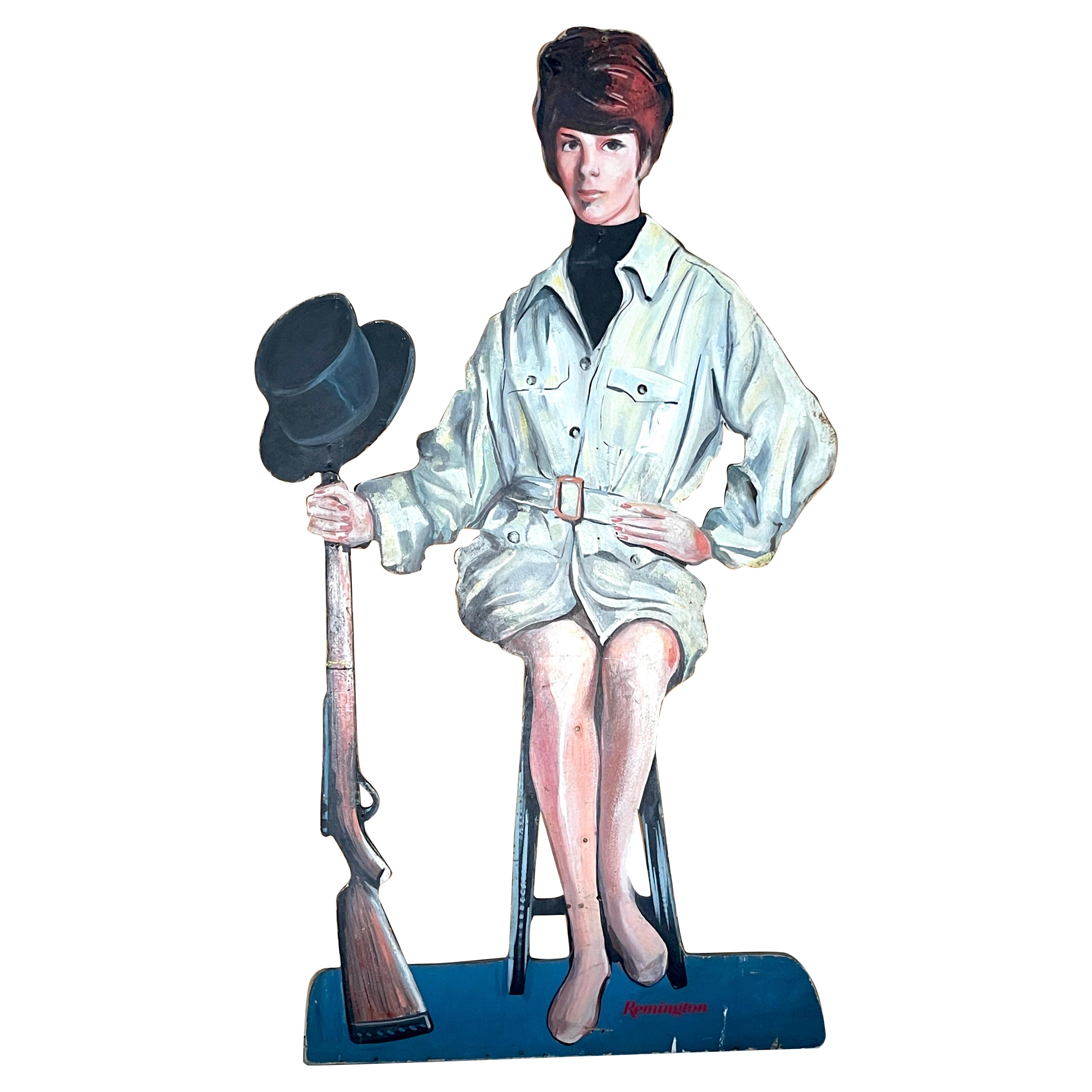 1960s Remington Rifle Life Size Advertising Dummy Board Seated Bond/ Mod Girl  en vente
