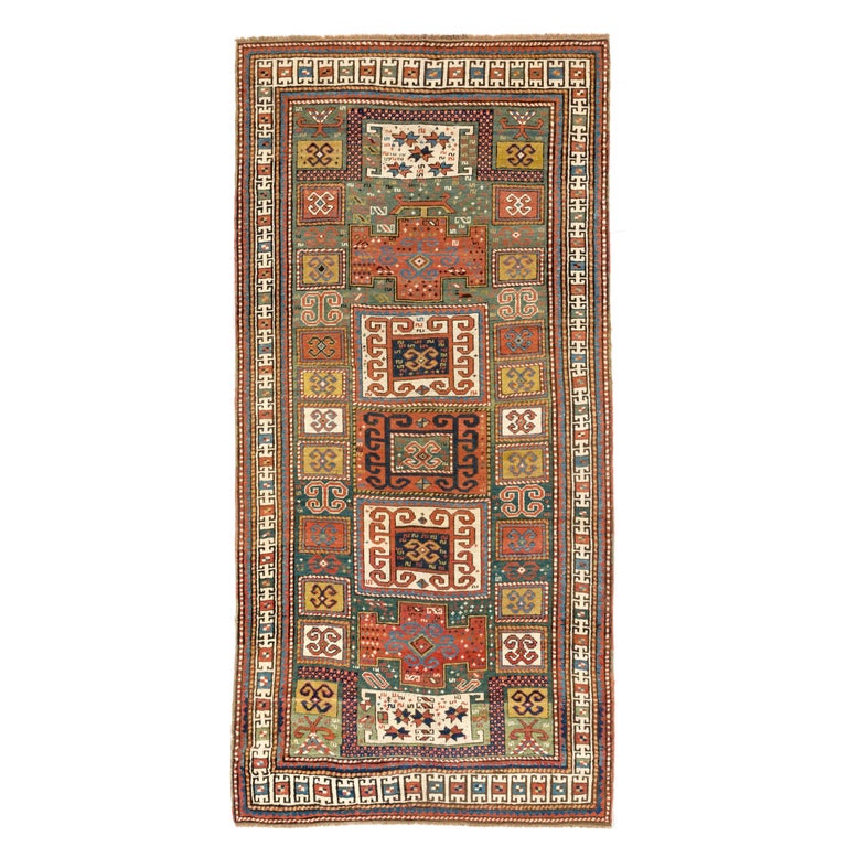Tapis Shirvan beige motifs caucasien - Le Laboratoire du Tapis - Restauration de tapis à Paris