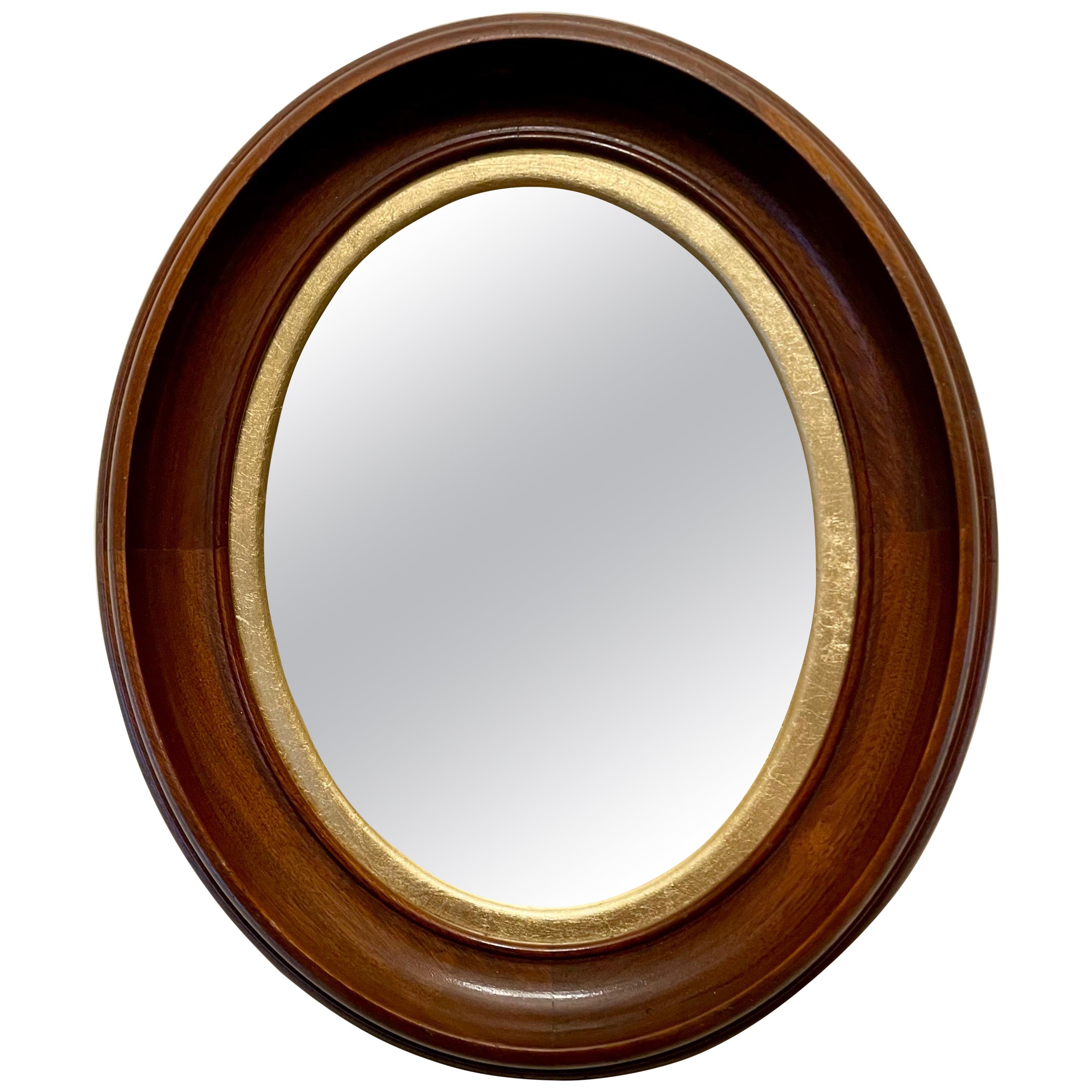 Miroir vintage en noyer et doré en vente