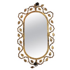 Oval Mirror in Gilt Iron with Foliage Floral Motifs