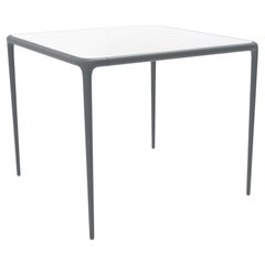 Xaloc Grey Glass Top Table 90 by Mowee