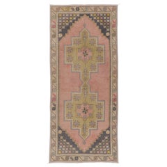 Vintage HandKnotted Wool Turkish Rug with Geometric Design in Muted Colors