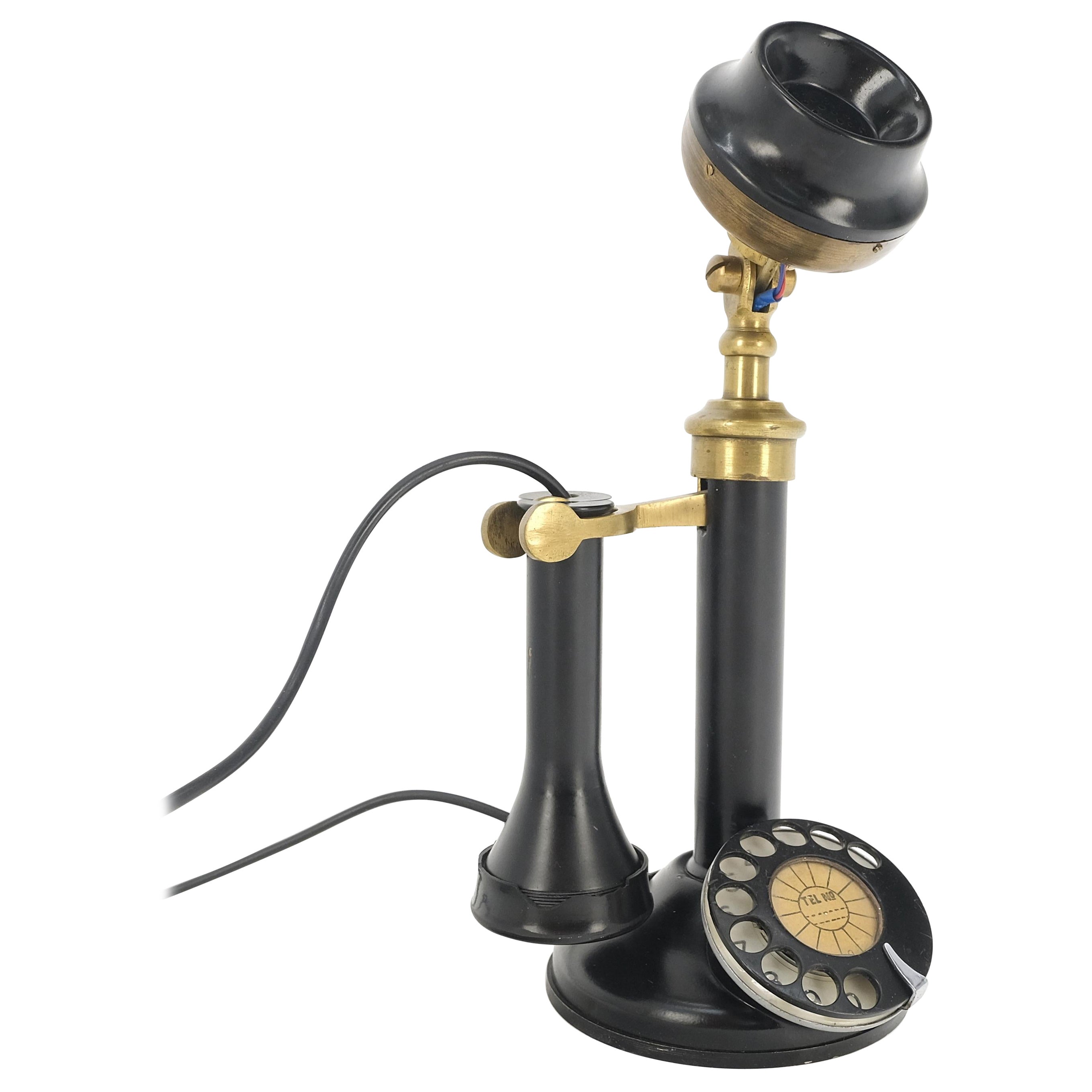 What was the first telephone made out of?