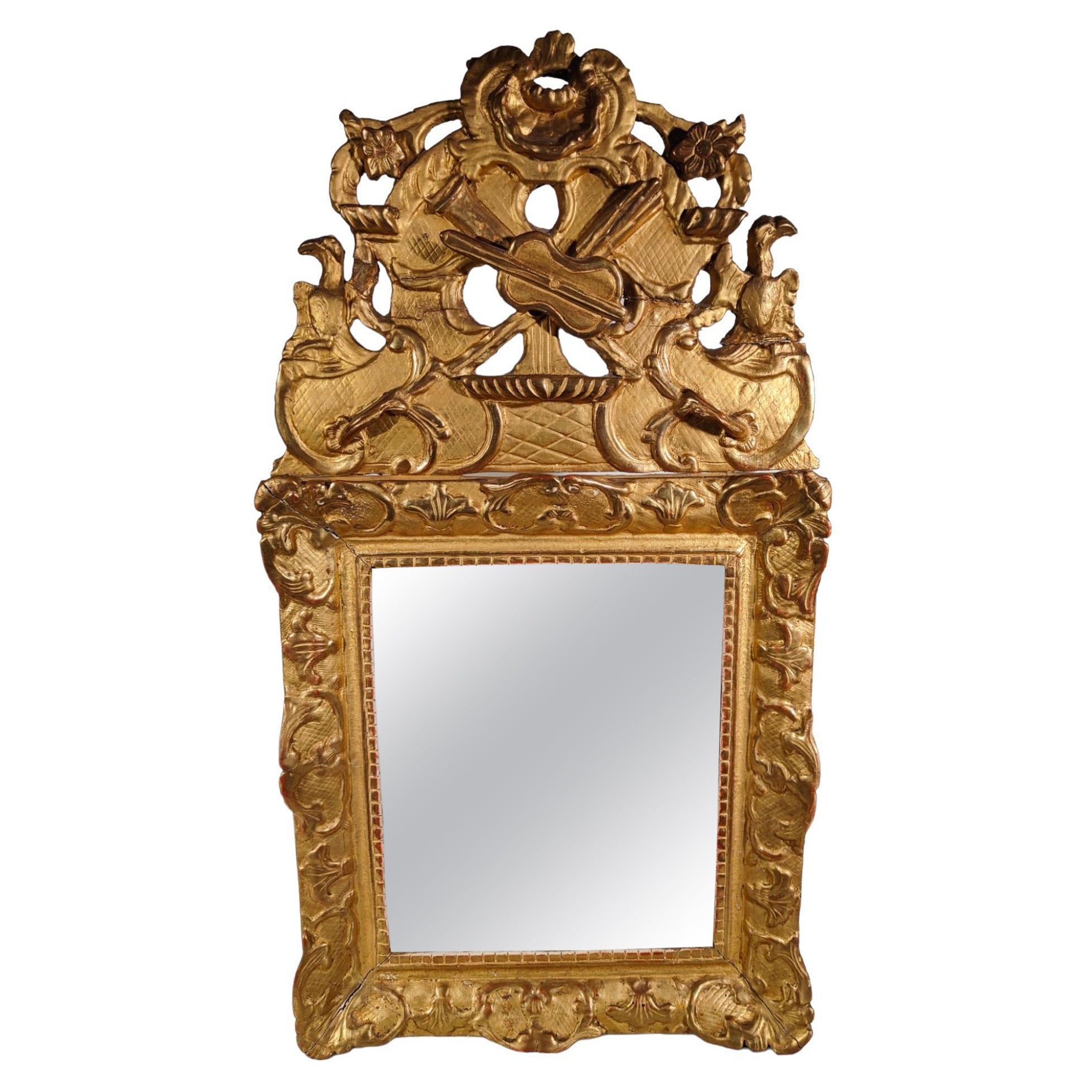 Miroir Louis XVI et bois doré.