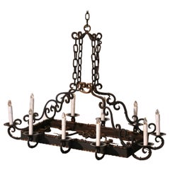 Antique Early 20th Century French Gothic Flat Bottom Iron Ten-Light Chandelier