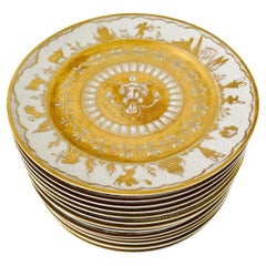 Lot de 14 assiettes en porcelaine Le Tallec peintes à la main avec motifs de mythologie grecque en or