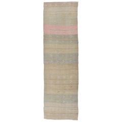 Vintage Kilim Runner with Stripes and Geometric Tribal Motifs in Light Tones