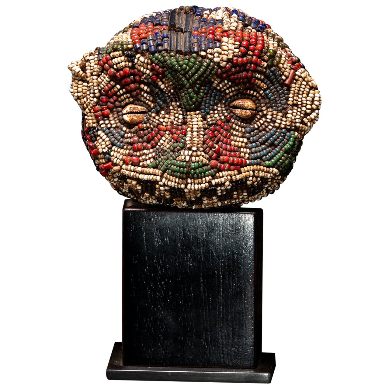 Bamileke Old  Anthropomorphic Trophy Head embroidered with European Glass Beads For Sale