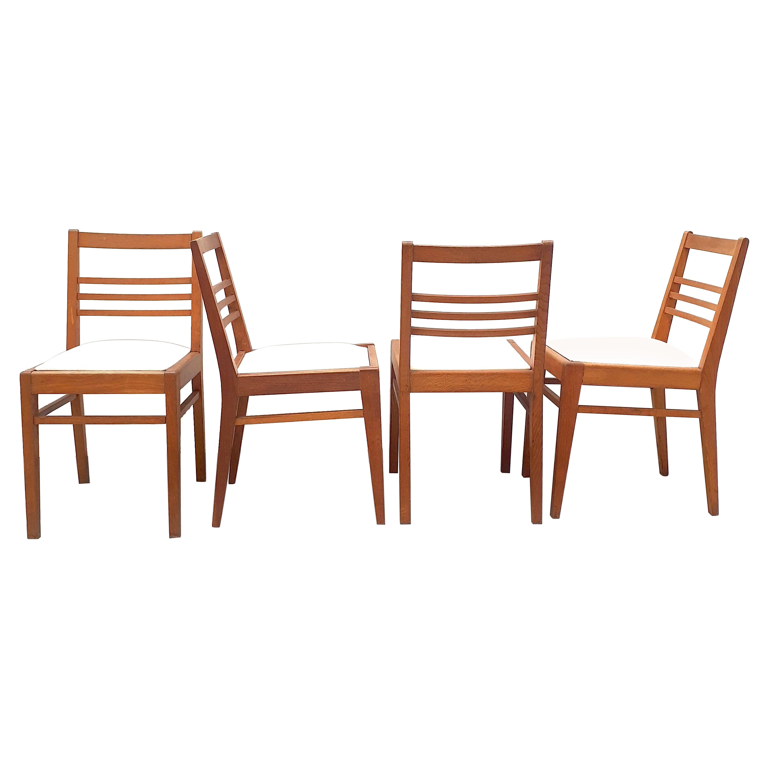 Ensemble de 4 chaises en Oak avec assise en tissu blanc par René Gabriel, années 1950