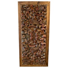 Hand-Carved Wooden Relief with Framed Flower and Leaf Decoration