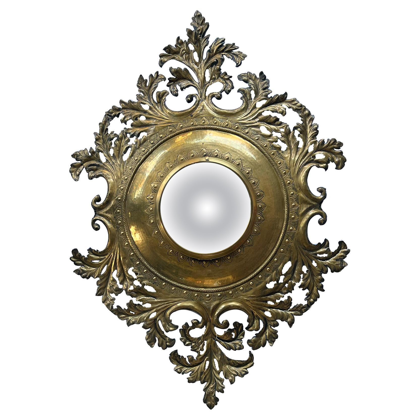 French Rococo Revival Repoussé and Cut Brass Foliate Convex Mirror For Sale