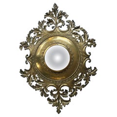 Antique French Rococo Revival Repoussé and Cut Brass Foliate Convex Mirror
