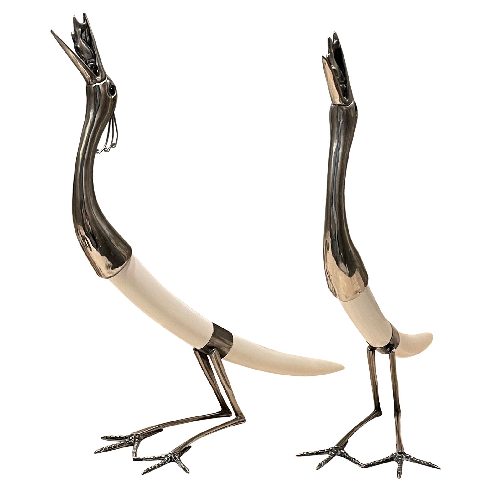Pair of Hollywood Regency Silver- Plate and Resin Figural Cranes by Hauy Pouigo For Sale