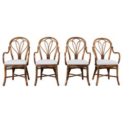 Set of Four McGuire Art Nouveau Style Rattan Dining Armchairs