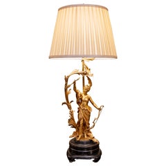 Lampe figurative en bronze doré du XIXe siècle signée Moreau
