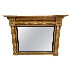 Magnifique miroir en bois doré du début du 19e siècle