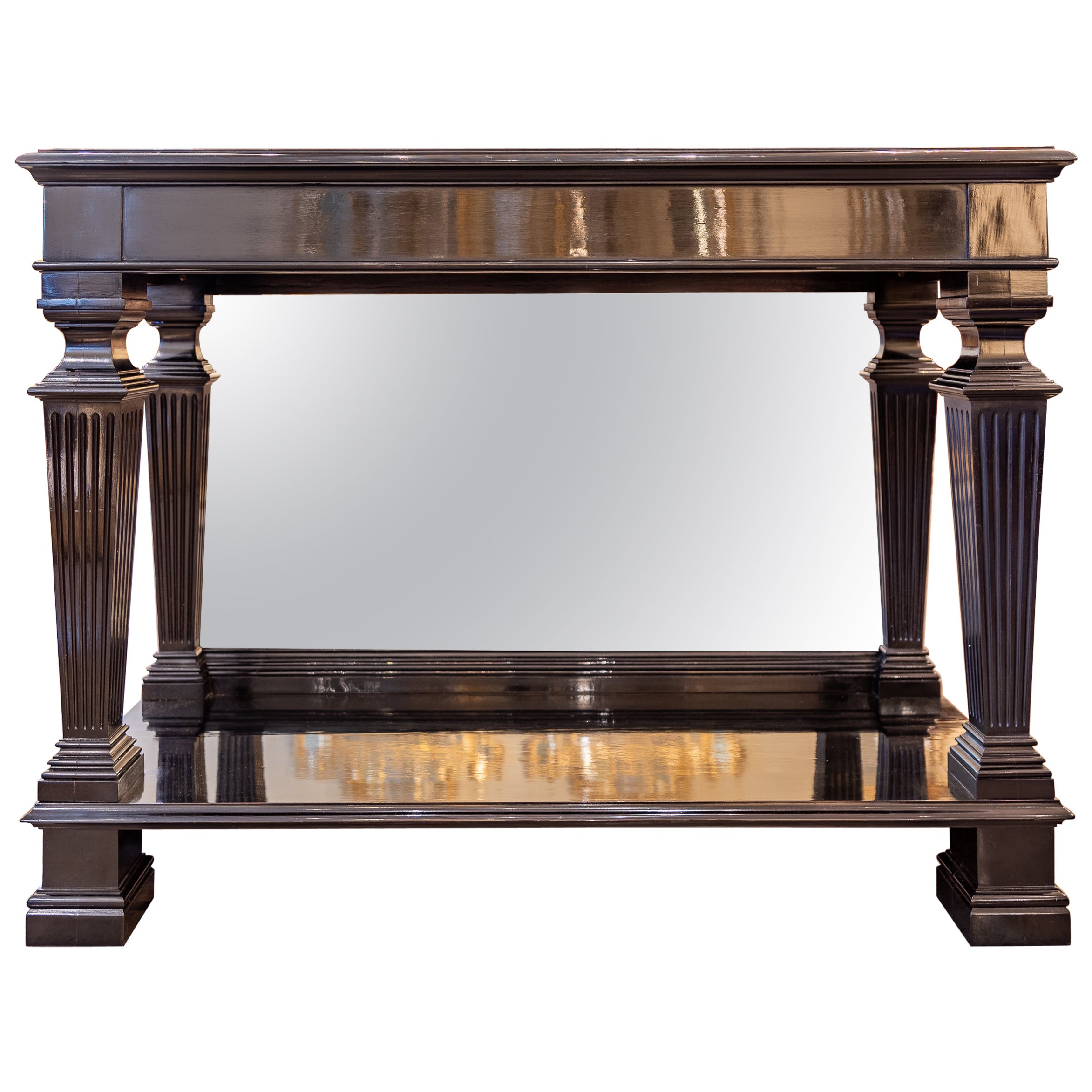 Une belle console Charles X du 19ème siècle en bois d'ébène avec support en miroir  en vente