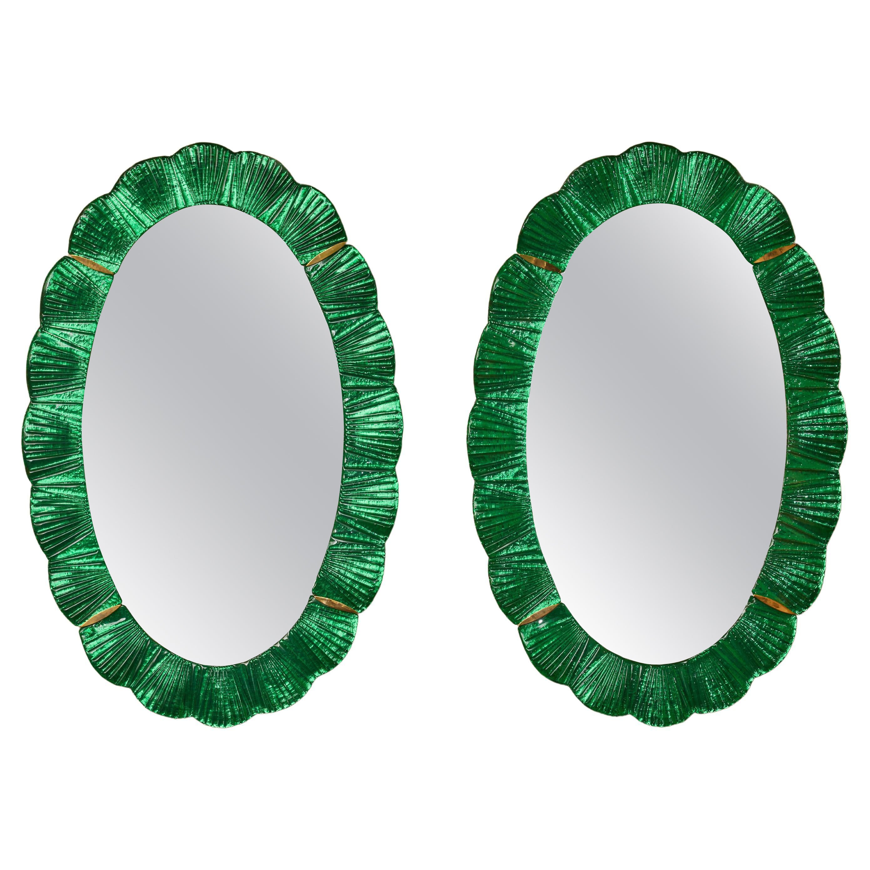Paire de miroirs ovales en verre de Murano teinté