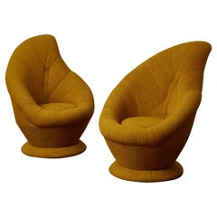 Pair of high armchairs by Studio Glustin.