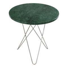 Grande table ovale verte en marbre indio et acier d'Oxdenmarq