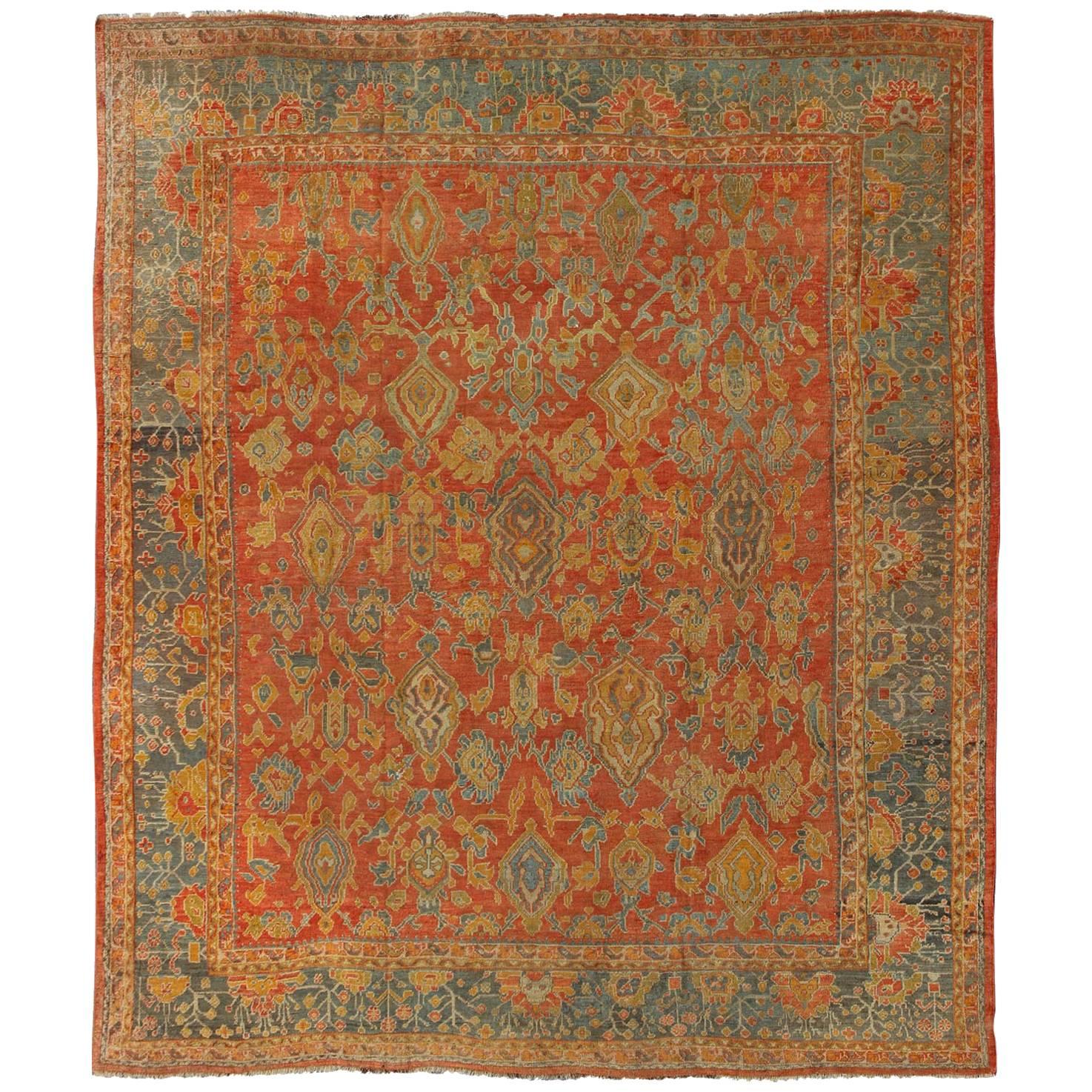 Antique Turkish Oushak Rug in Terracotta With All-Over Flower, Leaves and Vines  For Sale