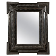 Dutch 18th Century Dark Brown Carved Wooden Mirror with Protruding Corners