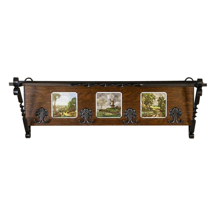 Dutch Oak Wall Coat Rack with Decorative Tiles from the Early 20th Century For Sale
