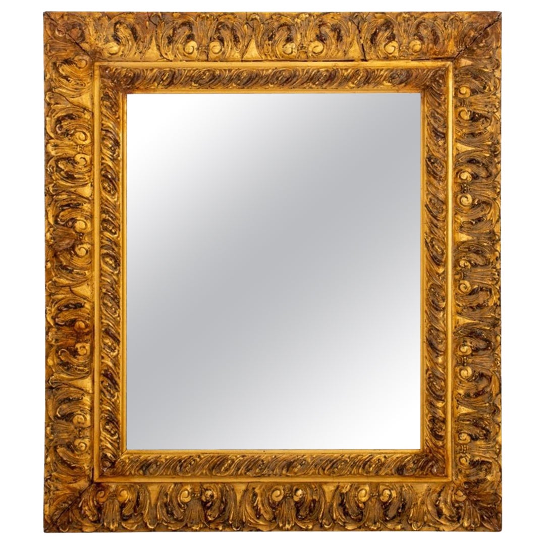 Miroir de cheminée en bois doré sculpté de style néo-baroque