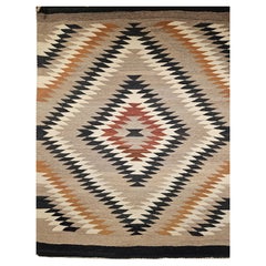 Vintage Native American Navajo Rug in Eye Dazzler Pattern in Earth Tone Colors