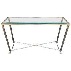 Table console de style Jansen en acier et laiton 