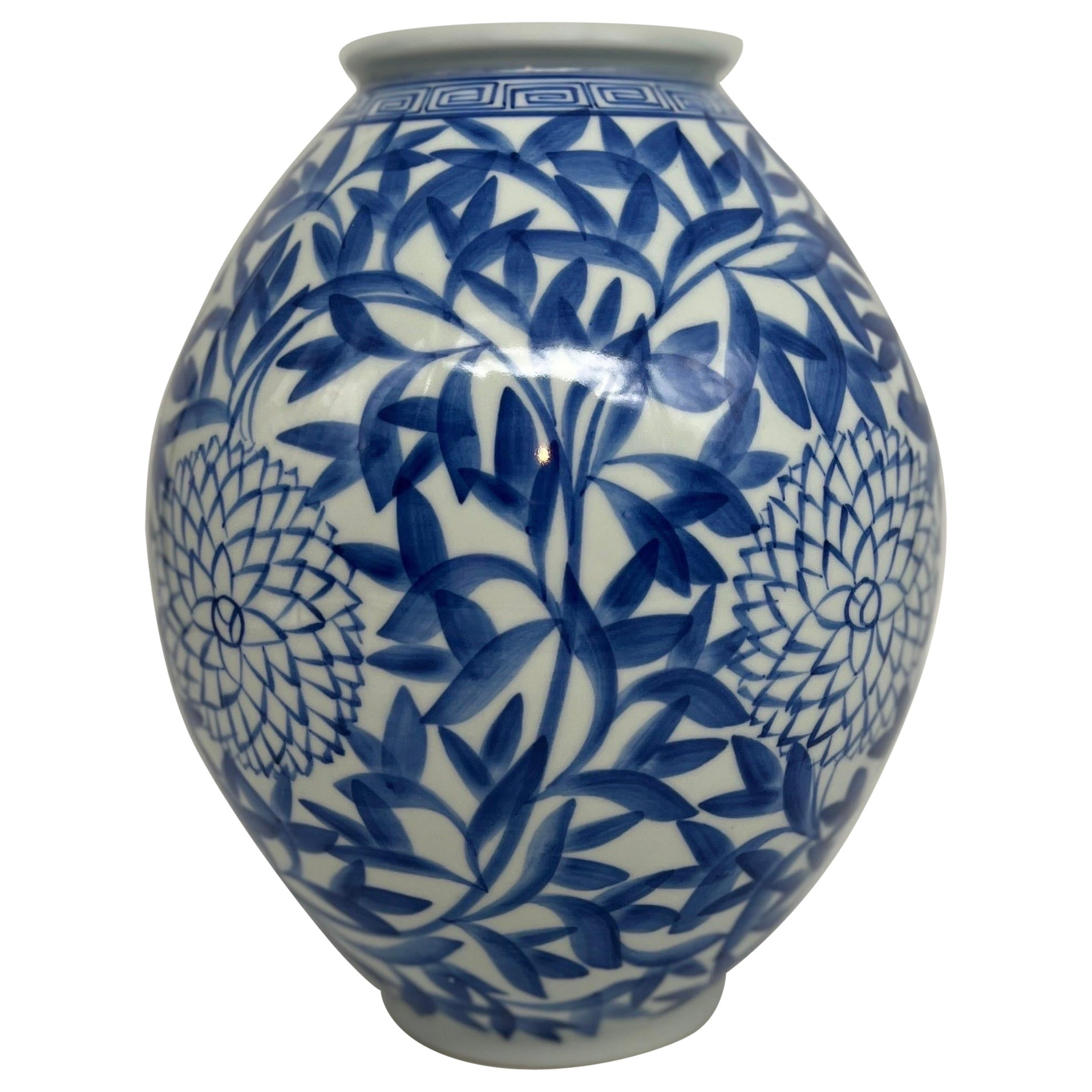 Vintage Japanese Blue and White Floral Bamboo Decorated Vase For Sale
