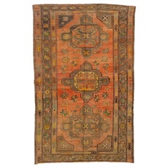 Antique Turkish Khotan Handmade Wool Rug with Tribal Terracotta Field