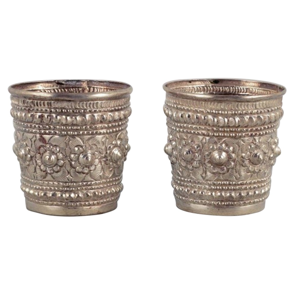 Chinese Silversmith, Two Small Goblets Richly Decorated in Relief, Approx. 1900 For Sale