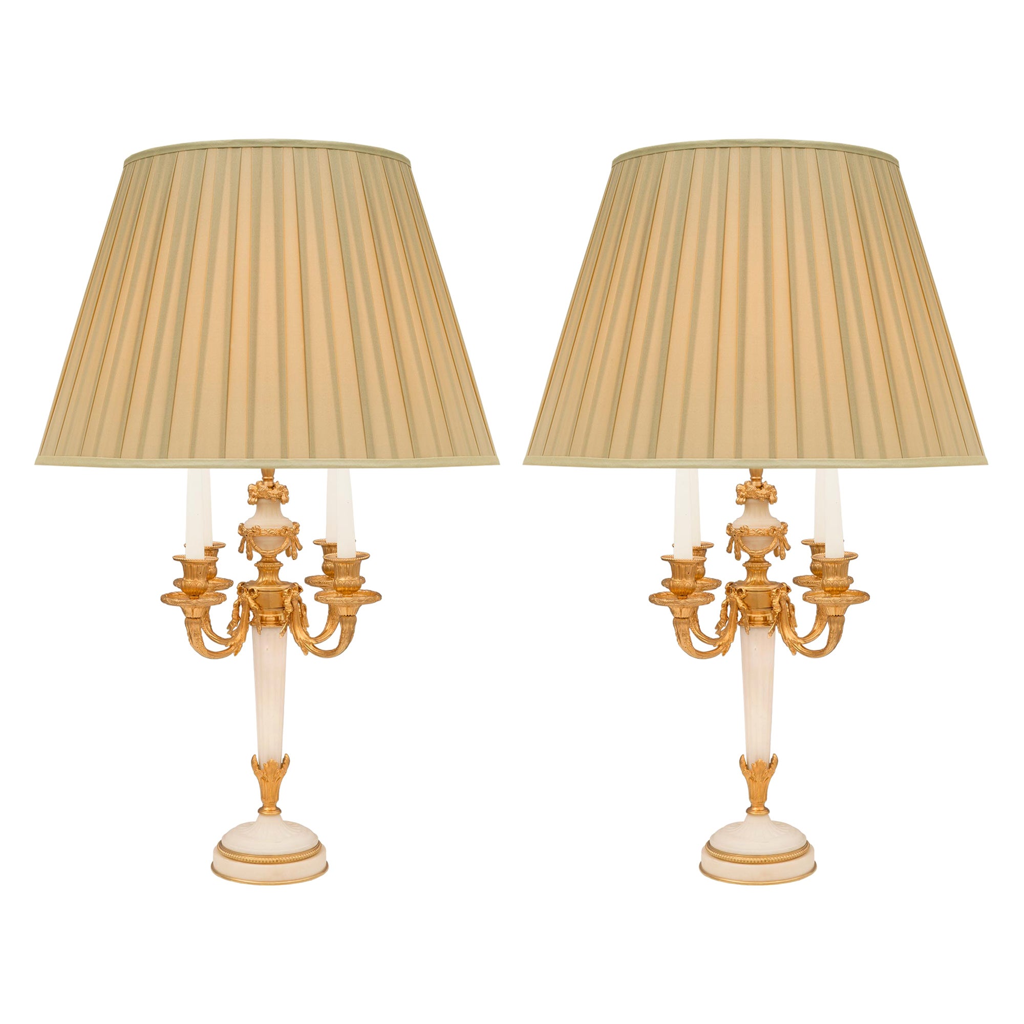 Pair of French 19th Century Louis XVI St. Ormolu and White Carrara Marble Lamps