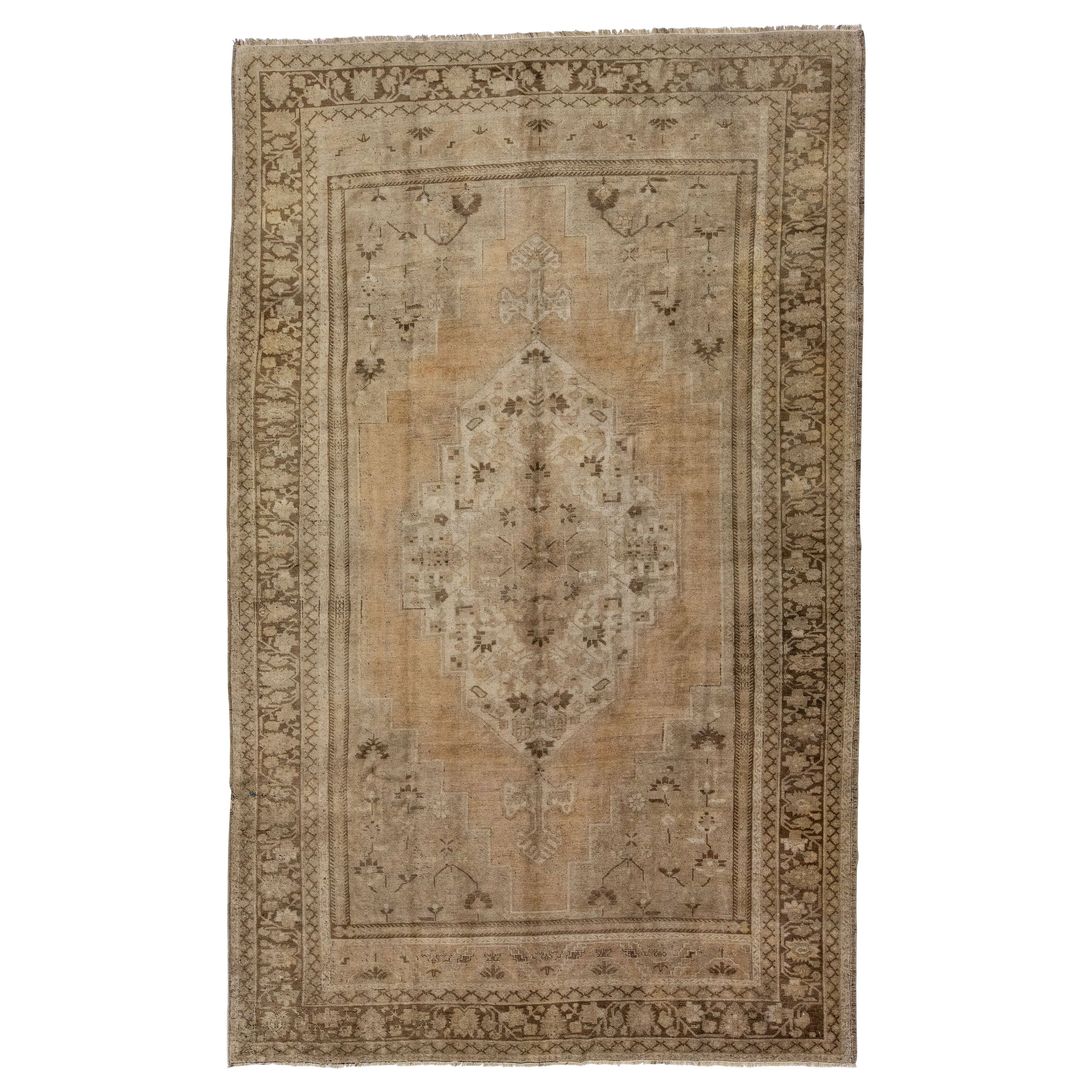 Brown Antique Khotan Handmade Wool Rug with Medallion Design