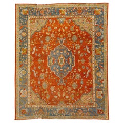 Ancien tapis turc d'Oushak en laine orange à médaillons fait à la main