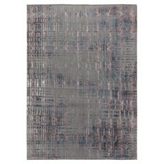 Tapis abstrait de Rug & Kilim en bleu et gris, motifs floraux d'un rose discret