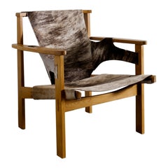 Carl-Axel Acking "Trienna" Armchair in Oak & Cow Hide Produced in Sweden, 1950s 