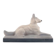 François Levallois (1882-1965). Chien couché en céramique. style Art déco, années 1940